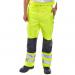 In the photograph, a pair of yellow Beeswift high-visibility trousers are standing out against a dark background. The trousers have a contrast design and are in size 4XL. The reflective strips on the trousers make them perfect for visibility in low light conditions.