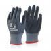 The photo shows a pair of Beeswift ARC Flash Gloves in size XXL. The gloves are coated with a mix of NITRILE and PU for added protection and grip. They appear to be a bright yellow color with textured palms and fingers. The gloves have a close fit and are designed for personal protection against electrical hazards.