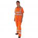 A photo of Beeswift High Visibility Trousers Beeswift Birkdale Trousers in vibrant orange shows a durable and functional garment. The trousers have reflective strips for safety and a comfortable fit.