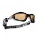 The image shows a pair of yellow Bolle glasses and goggles, known as the Safety Tracker, with the brand name prominently displayed. The glasses have sleek, modern frames and curved lenses that provide full coverage and protection. The straps are adjustable and the nose piece is cushioned for maximum comfort. This high-quality eyewear is perfect for outdoor activities or work environments where safety is a top priority.