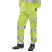 The picture shows a pair of high-visibility trousers in a combination of yellow and navy. They are designed for protection against ARC flashes and have the brand name Beeswift printed on them. The trousers have a saturn design and are labeled as 30T in size.