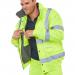This photograph features two Beeswift high visibility bomber jackets in a vibrant Saturn Yellow color. The jackets are fleece lined for added warmth and comfort. Perfect for working outdoors in low visibility conditions.