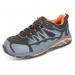 The image shows a pair of Beeswift Shoes Beeswift Footwear trainers in size 9. The shoes are black, orange, and grey in color with a composite material. They are labeled as S3, indicating they provide protection against water and punctures.