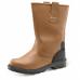 The photo shows a pair of Beeswift Premium Rigger Boots in a rich tan color. The boots have a sturdy construction with reinforced laces and a padded collar. The Beeswift logo can be seen on the side of the boots. These boots are perfect for any job that requires heavy-duty foot protection.
