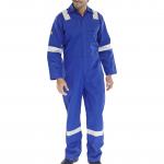 The picture shows a royal blue boilersuit with a Nordic design, made by Beeswift. It features fire retardant material and has the branding Beeswift Overalls and Coverall on the chest. The size is labeled as 38.