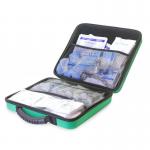 The photo shows a large case with a red cross and the words First Aid on the front. Inside, there are various medical supplies and equipment neatly organized in compartments. The kit is designed to serve 1-50 people and is suitable for emergency situations.