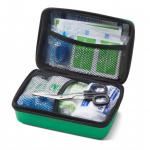 The image shows a compact, red First Aid kit with the words Click Medical Travel First Aid Kits printed on the front. Inside, there are various medical supplies neatly organized, including bandages, gauze, and ointments. The case is small and convenient for travel, making it easy to carry in a backpack or suitcase.