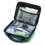 This photo features a large travel first aid kit in a medium Feva case. The kit is compliant with BS8599-2 standards and is designed by Click Medical. It includes various medical supplies and is perfect for travels and emergencies.