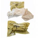 The photograph shows a compact, versatile first aid supply wrapped in sleek packaging. Its 4-inch size and OLAES MODULAR BANDAGE label are clearly visible, and the brand name Olaes First Aid Supplies is printed in bold font. This item is a valuable addition to any first aid kit or emergency preparedness plan.