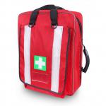 The picture shows a red Click Medical paramedic rucksack with the words First Aid Supplies on the front. The backpack is filled with various medical supplies and has multiple pockets and compartments for organization. It also has adjustable straps for comfortable carrying.