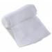 The photograph shows a small first aid dressing by Click Medical, with a compact size and simple design. The packaging is labeled with the product name and company logo, and the dressing itself appears to be made of sterile, white material. It has a smooth, flat surface and is neatly folded, ready for use in a medical emergency.