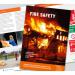 In the image, there are stacks of Click Medical training books and manuals, with one specifically labeled for fire safety (CM1320). The books have bright covers and are neatly organized on a shelf. Some books are open, revealing detailed diagrams and text.