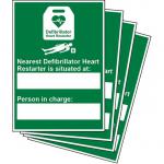 In the photo, a Click Medical Defibrillator sign is shown with the words NEAREST AUTOMATED DEFIBRILLATOR in bold letters. The background is white and the text is in red and black. A picture of a defibrillator appears in the center, with a clickable click button on the bottom right corner. The sign is rectangular in shape and has rounded edges.