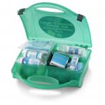 This photo captures a compact and complete first aid kit designed for playgroups and childminders. The bright red case contains essential supplies for treating minor injuries and handling emergencies with ease.