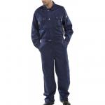 This photograph showcases a premium navy blue Boilersuit from Beeswift, a brand known for its high-quality workwear. The Boilersuit features a durable construction and a comfortable fit, perfect for any task that requires protection and flexibility. The classic navy blue color adds a professional touch to the overall look.