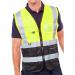 The photo shows a group of Beeswift high visibility vests in vibrant saturnyellow and sleek black. The vests have a two-tone design with an executive waistcoat style. They appear to be in size XS.