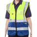 The image shows a bright yellow and navy high visibility vest made by Beeswift. It has a two tone design and is in the small size. The vest is clearly designed for high visibility in various working environments.