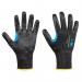The photo shows a pair of Honeywell Nitrile Gloves in black. The gloves have a Coreshield Smooth Nitrile Cut F design, providing excellent protection. These gloves are perfect for various tasks and have a sleek and professional appearance.