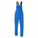 In the photograph, a person is wearing a Hydrosoft Weatherproof Bib & Braces in royal blue. The bib and brace set is made by Hydrowear Sandhurst and is designed to be waterproof with the Hydrosoft technology. The person is standing outdoors with a serious expression on their face, showcasing the durability and functionality of the product. The royal blue color adds a vibrant pop to the overall look.