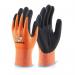A photograph of Beeswift Gloves Beeswift Kutstop Micro Foam Nitrile Amber Cut Level 3 Amber L KS13L shows a pair of sturdy gloves made of micro foam nitrile material. The gloves are made to protect against cuts and are a vibrant amber color. They have a snug fit and provide excellent dexterity for handling tasks.