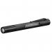 This photo features a sleek and compact Ledlenser P4R Core Led Torch in silver, with a powerful LED beam. The torch is held in hand against a dark background, illuminating the area with its bright light.