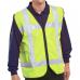 In the photo, a bright yellow high visibility vest with reflective strips is shown. The vest has a front light attached and pockets on the chest. It is labeled as a Saturn Yellow L/XL size.