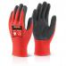 The image shows a versatile pair of Beeswift gloves. They are made of black latex and poly material and feature a snug fit. The gloves have a smooth texture and are suitable for a variety of tasks. The label Beeswift can be seen clearly on the wrist of the glove.