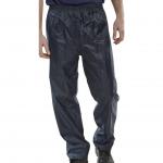 This image features a pair of navy Beeswift NYLON B-DRI trousers from Beeswift, in size L. The trousers are made of durable nylon material and have a sleek, waterproof design. They are perfect for staying dry in any outdoor activity.