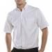 The picture is of a white short-sleeved Oxford shirt by Beeswift, size 17.5. The fabric appears crisp and smooth, with a subtle sheen. The shirt has a traditional button-down collar and a front pocket. The shirt is neatly folded, ready to be worn.