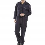 In the photo, a navy blue Beeswift boilersuit, size 52, is shown. The one-piece suit features a zipper down the front, multiple pockets, and a comfortable fit. The material appears durable and practical for various tasks.