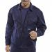 This image shows a navy blue Beeswift Poly Cotton Drivers Jacket, size 38. The jacket is made of a durable, breathable fabric, with multiple pockets and a full front zipper. The classic design is perfect for professional drivers, providing both style and functionality.