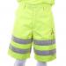 This image is a pair of high visibility shorts in a bright, Saturn yellow color by Beeswift. The shorts have a comfortable, relaxed fit and a reflective strip for added safety.