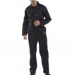 This photograph captures a sleek and professional-looking black Beeswift regular boilersuit, complete with all necessary features and durable materials. The logo of the brand is prominently displayed on the chest, and the rugged design exudes strength and reliability. The dark color and clean lines make for a stylish and functional workwear option.