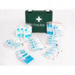 The photo depicts a well-stocked first-aid kit, designed for up to 20 people. It includes various items for treating minor injuries and emergencies, all neatly organized in a blue dot-patterned bag. This kit is compliant with HSE standards and suitable for various environments.