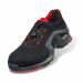 The photograph captures a pair of sleek Uvex Shoes UVEX 1 X-TENDED SUPPORT S1 SRC SHOE in size 08. The shoes feature a sturdy yet lightweight design, with a non-slip sole and a stylish black and orange color scheme. The UV8512808 shoes are designed to provide ultimate support and protection for the wearers feet.