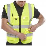 This photograph features two Beeswift high visibility vests in Saturn Yellow. The vests are size 3XL and have an executive style design. They are waistcoats and perfect for increasing visibility in hazardous or low light environments.