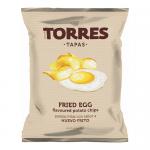 A glossy Torres crisps bag shows a bold logo atop yellow-and-white packaging featuring a large fried-egg illustration and scattered potato crisps. Clean typography lists the flavour; light reflections and slight bag crease add realistic texture against a neutral background. Soft subtle gloss finish.