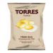 A glossy Torres crisps bag shows a bold logo atop yellow-and-white packaging featuring a large fried-egg illustration and scattered potato crisps. Clean typography lists the flavour; light reflections and slight bag crease add realistic texture against a neutral background. Soft subtle gloss finish.