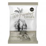 Bright, matte bag of Two Farmers crisps shows earthy mushroom artwork and wild garlic sprigs against a pale green background. A cluster of golden, ridged crisps spills from an open packet. Bold brand name sits at the top, with flavor text beneath. A thin nutrition panel appears on side. gentle tones