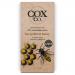 Cox & Co. Bee Pollen & Honey chocolate bar rests on a plain surface. The wrapper mixes warm yellow and deep brown with a neat logo and bee illustration. A partly unwrapped dark chocolate square shows golden pollen specks and a glossy honey drizzle. The photo uses soft studio lighting. Neutral tones.