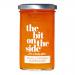 Six glass jars of The Bit on the Side Seville Orange Marmalade sit in a neat row, amber preserve and suspended peel visible through clear glass. Each jar has a white label with bold black logo and a black lid. Warm studio light highlights glossy texture and subtle reflections. On a wooden surface lit.