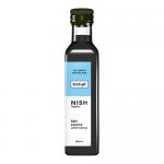 A photo shows twelve 250ml bottles of Sozyë NISH Sauce Fish Sauce Alternative neatly arranged in two rows inside a corrugated tray. Each glossy bottle features a green Sozyë label with logo, product name in bold, small text and a simple fish silhouette; light glints off caps. Light and shadow play..