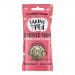Photo shows a neat display of twelve 25g pod packs of Taking The Pea crisps in Smoked Ham flavor. Each slim packet features green pea graphics, a ham illustration and crisp imagery; several pods lie flat while others stand, exposing packet fronts and backs.