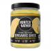 An image displays six 450g jars of Hunter & Gather grass-fed British organic ghee arranged in two rows. Transparent jars reveal smooth, pale-gold ghee. Cream labels with green accents show the Hunter & Gather logo and product name. The scene rests on a neutral surface.