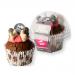 A row of six cupcake-shaped dog treats sits in a branded cardboard tray. Each vanilla sponge wears swirled pink frosting topped with a tiny white heart sprinkle. Soft pastel packaging features The Barking Bakery logo, paw-print accents and playful typography.