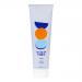 White plastic bottle with a soft-pink pump dispenses foaming facewash. The label shows bright fruit illustrations - berries and citrus slices - on a pale peach background, with bold brand name and product title in clean typography and small icons denoting volume.
