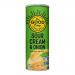A cluster of eight bright green 160g packets of The Good Crisp Co Sour Cream & Onion crisps fills the frame. The brand logo sits atop stylized onion and herb illustrations beside bold white product lettering. Glossy wrappers reflect studio light; a couple of crisps peek from an open bag. Soft light.