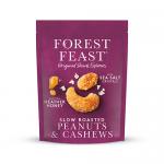 Image shows a neat grid of eight Forest Feast 120g packs. Each slender packet displays a creamy label with Scottish heather illustration, clear window revealing honey-roasted peanuts and cashews with glossy glaze, and small icons denoting fruit, nuts and seeds. Earthy tones and subtle paper texture.