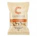 A 45g Cambrook Baked & Salted Cashews packet stands upright, showing the Cambrook logo, product name and a photo of golden cashews. The pack features nutrition icons, simple coloured graphics and a transparent window revealing roasted cashew pieces on a white background.