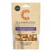 Image shows a small matte pouch of Cambrook Hickory Smoke Seasoned Almonds & Cashews. Warm brown and orange graphics feature the Cambrook logo, prominent 'Hickory Smoke' wording and realistic almonds and cashews scattered on the front with a faint wispy smoke illustration.